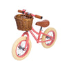 Banwood 'First Go!' Balance Bike in coral, available at Bobby Rabbit.
