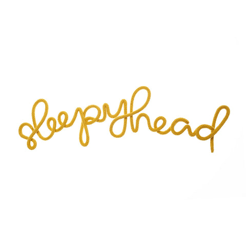 'Sleepyhead' Wall Decoration - Mustard Yellow by Hey Kiddo, available at Bobby Rabbit.